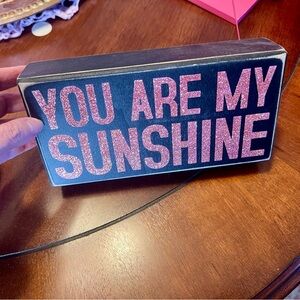 Cute black plaque with pink lettering